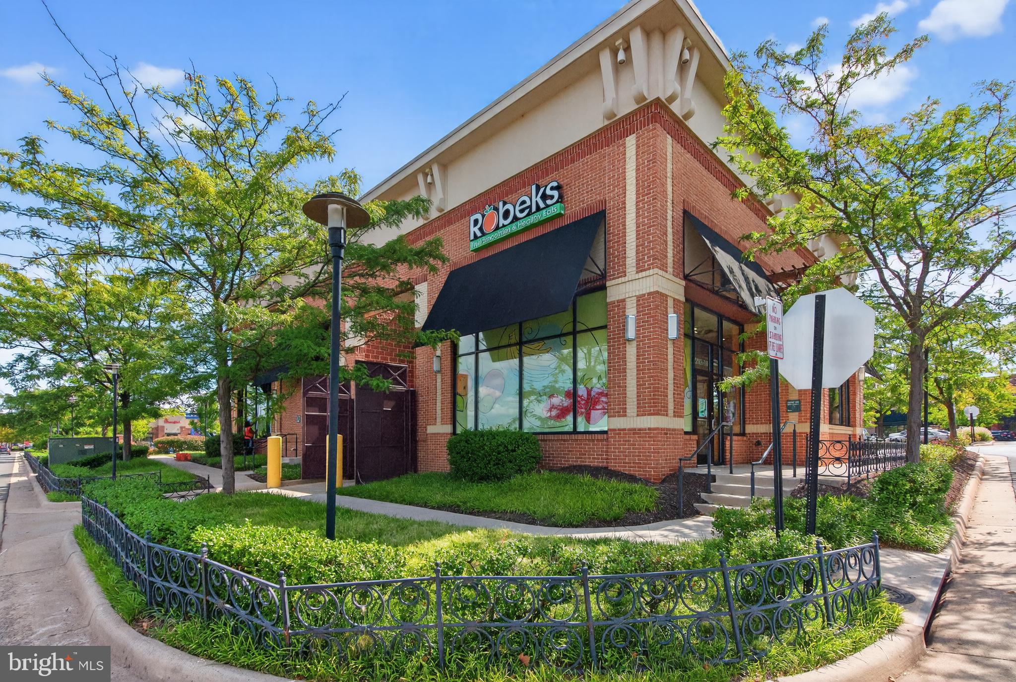 45445 Timber Trail Square Sterling, VA 20164 - Photo 34 of 38 a front view of a house with garden
