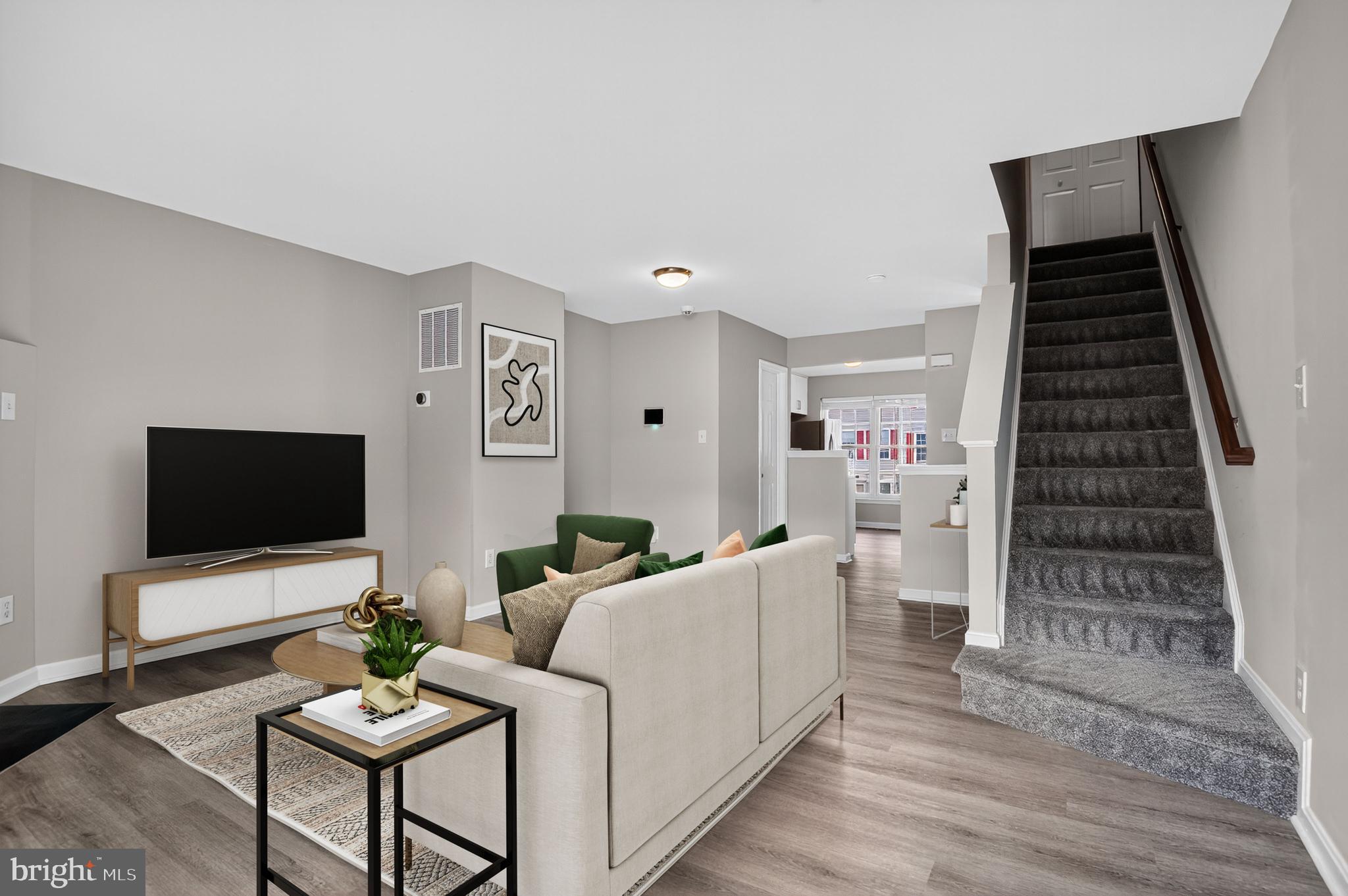 45445 Timber Trail Square Sterling, VA 20164 - Photo 4 of 38 a living room with furniture and a flat screen tv