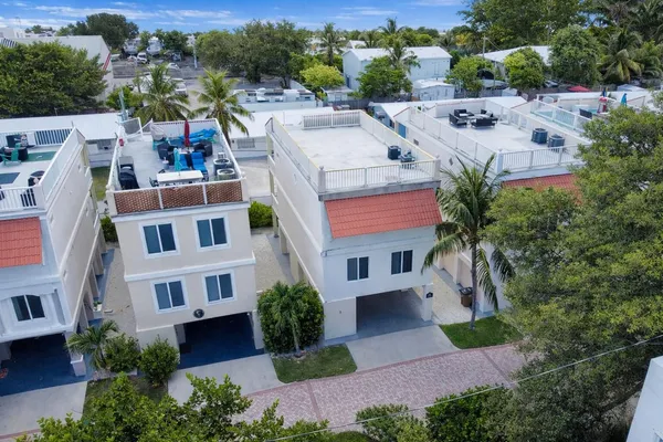 an aerial view of a house with balcony