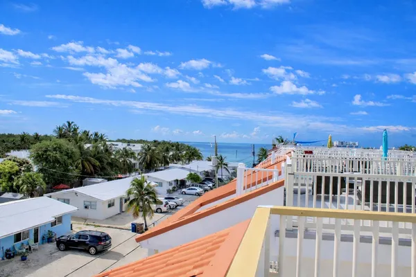 a view of a balcony with city view