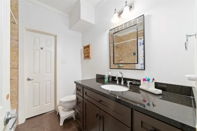 a bedroom with baby toys and wooden floor