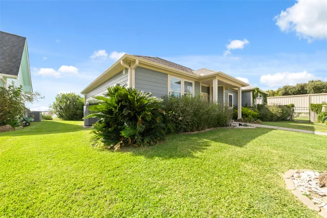 a balcony with furniture and garden view