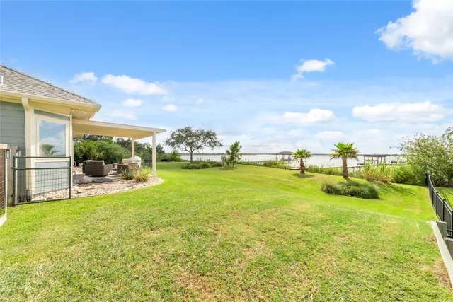 a view of a lake with a big yard