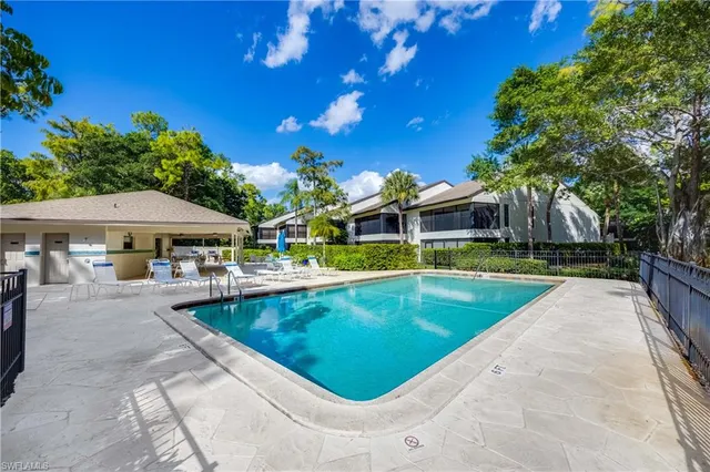 a view of a house with swimming pool