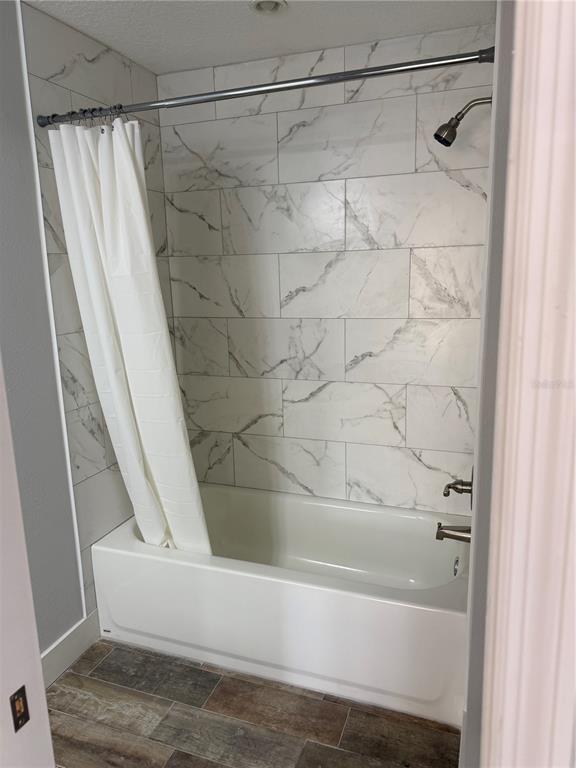 1209 1st Street Indian Rocks Beach, FL 33785 - Photo 5 of 8 a bathroom with a shower