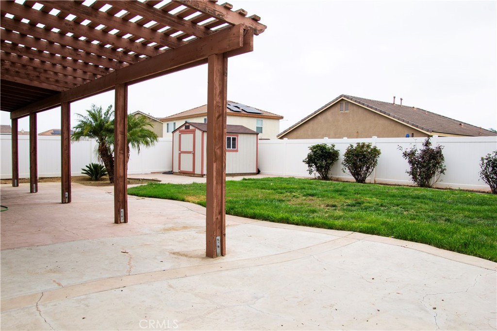 1325 Sunset Avenue Perris, CA 92571 - Photo 24 of 27 a front view of a house with garden