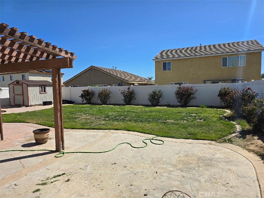 1325 Sunset Avenue Perris, CA 92571 - Photo 26 of 27 a view of a house with a yard