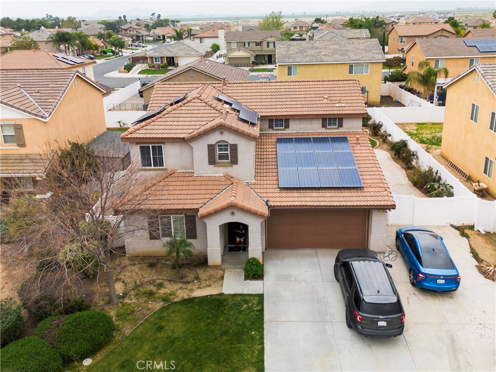 1325 Sunset Avenue Perris, CA 92571 - Photo 3 of 27 an aerial view of a house with a garden