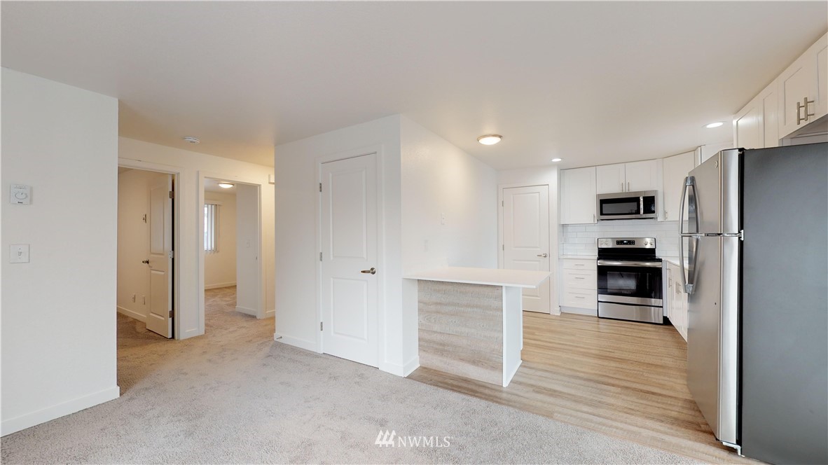 800 4th Street Sultan, WA 98294 - Photo 22 of 38 a view of kitchen with refrigerator and oven