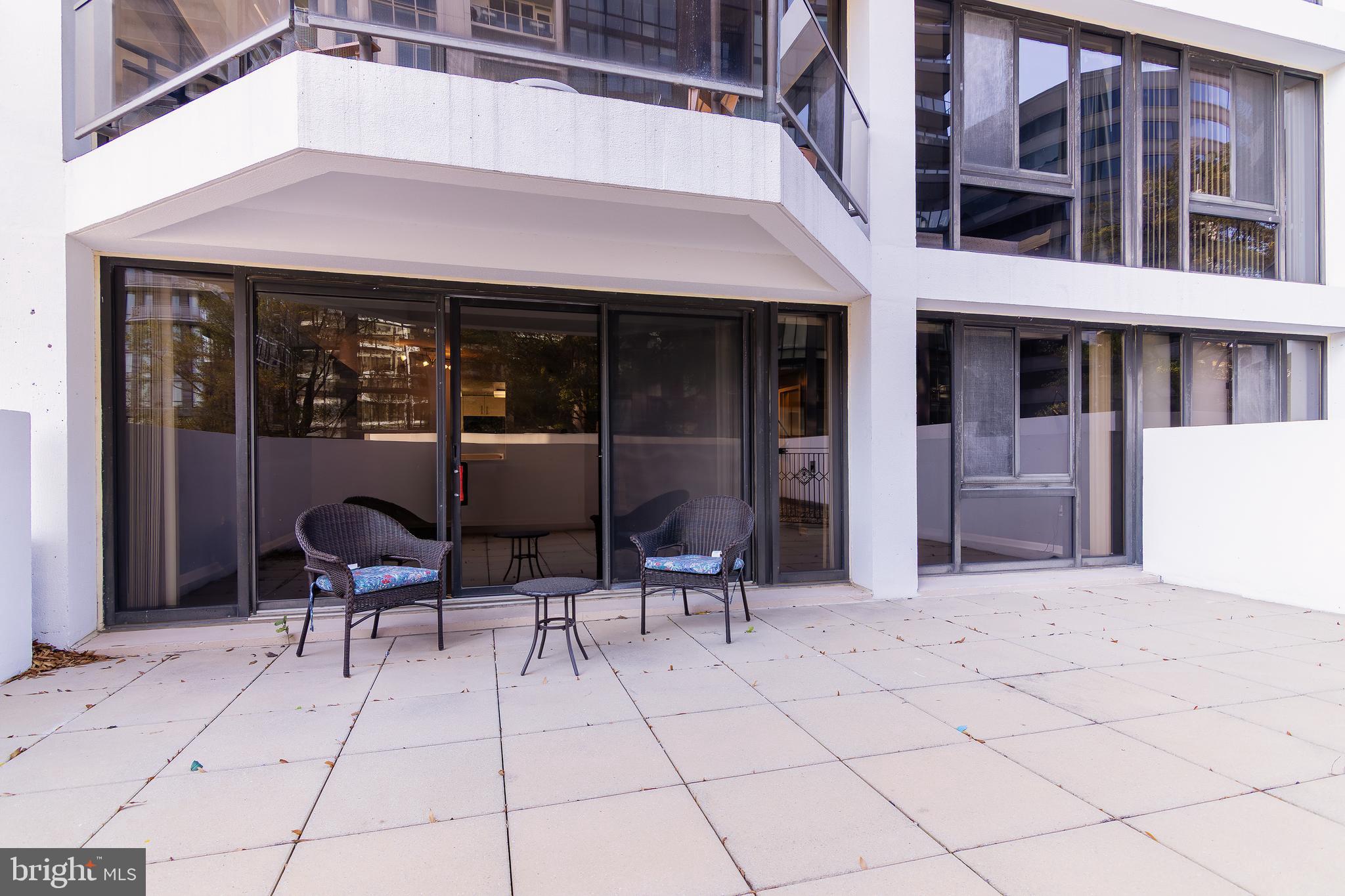 1530 Key Boulevard, Unit 205 Arlington, VA 22209 - Photo 22 of 33 a view of a building with sitting area and furniture