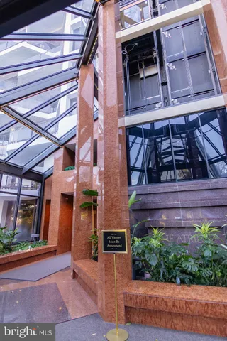 a view of a brick building with many windows