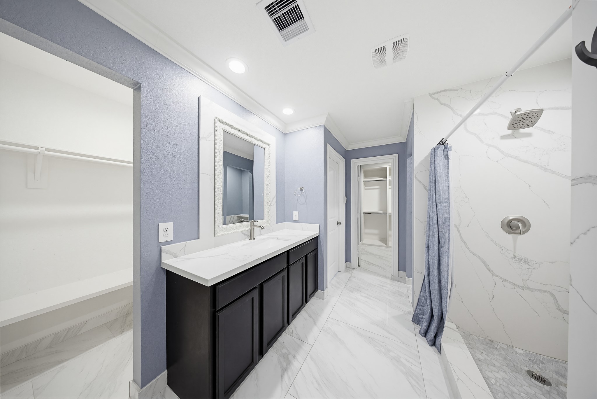 23210 Barberry Crk Trail Spring, TX 77373 - Photo 13 of 33 a bathroom with a sink and shower