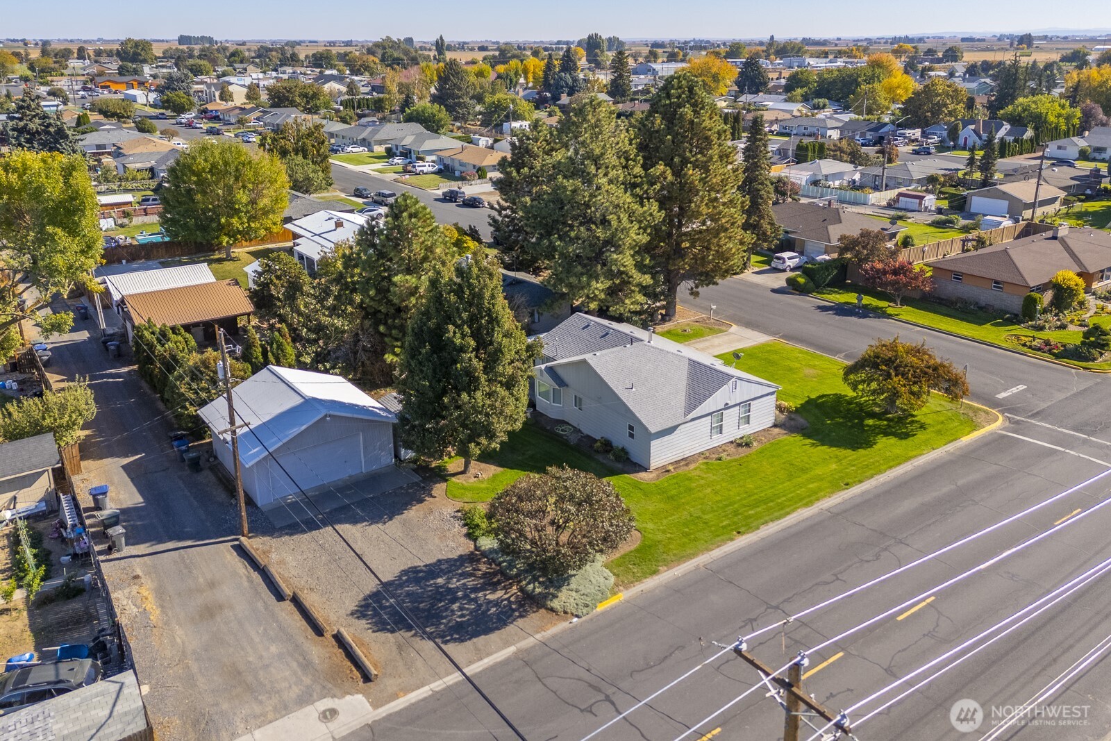 an aerial view of a house with a garden