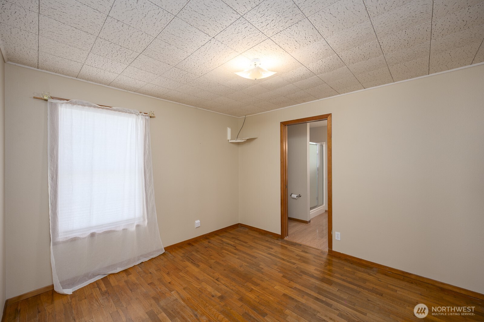221 K Street Southwest Quincy, WA 98848 - Photo 21 of 38 a view of empty room with wooden floor