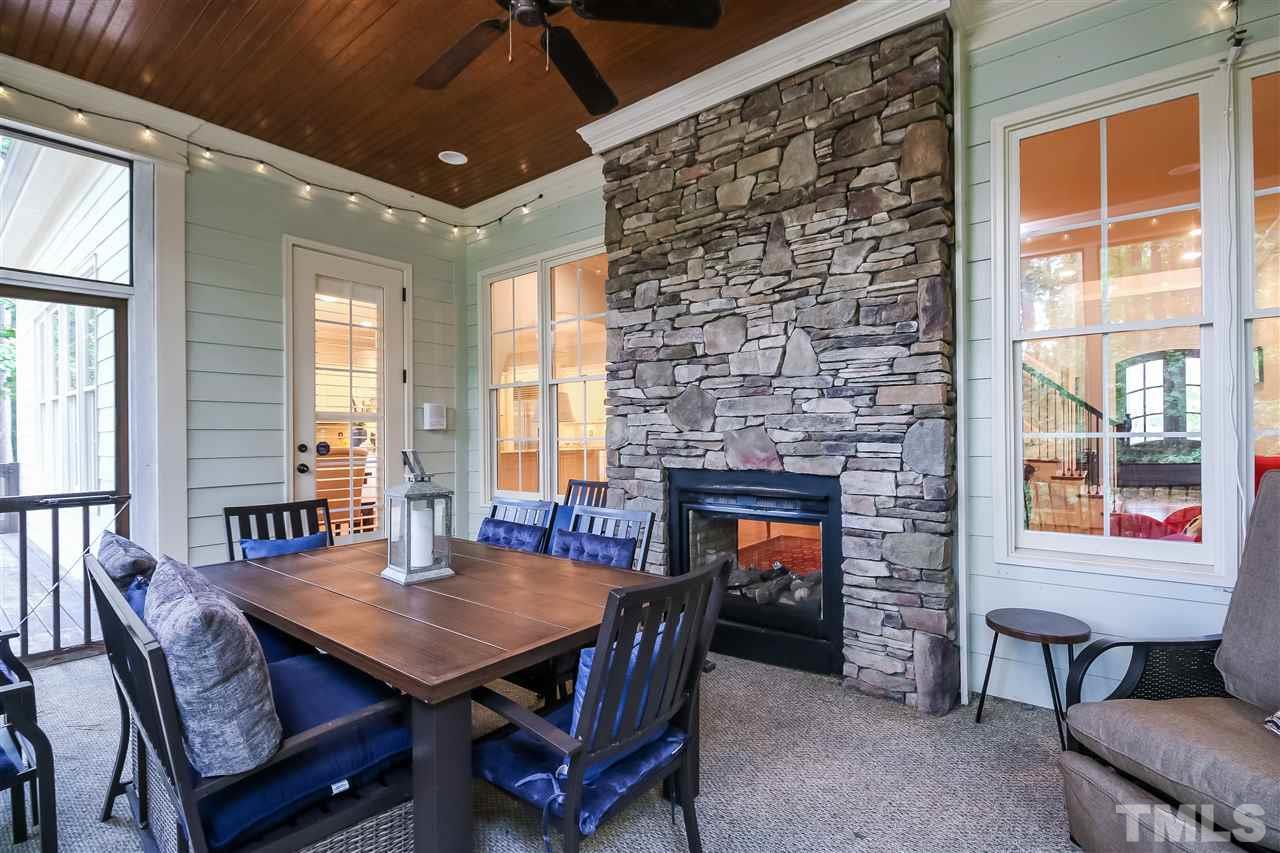 801 Keith Road Wake Forest, NC 27587 - Photo 11 of 25 Porch offers a double-sided fireplace