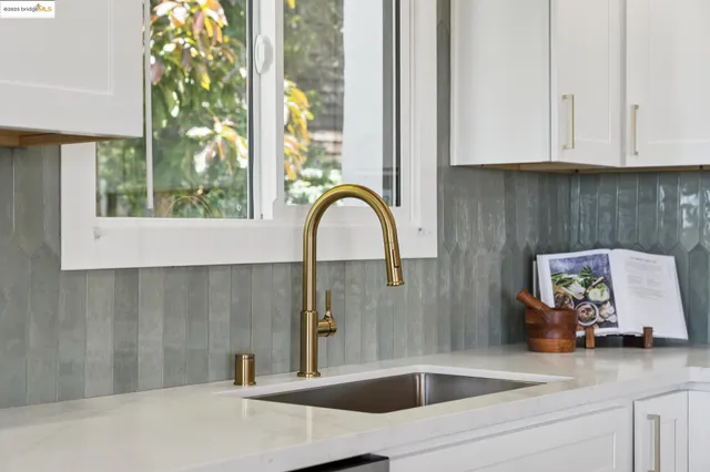 a stove top oven sitting on top of a wooden floor