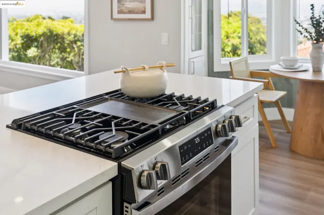 a bedroom with a large bed and a couch