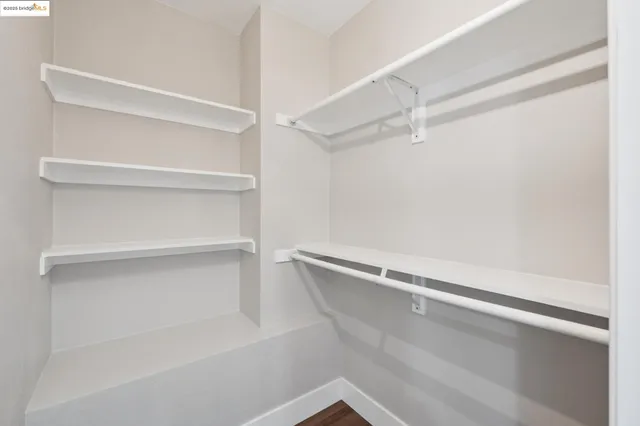 a kitchen with a stove a sink and a refrigerator