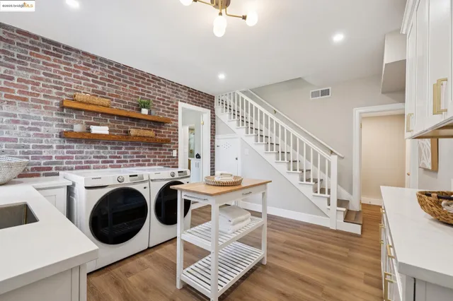 a bedroom with bed and wooden floor