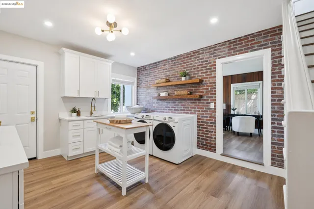 a bathroom with a sink a shower and a mirror