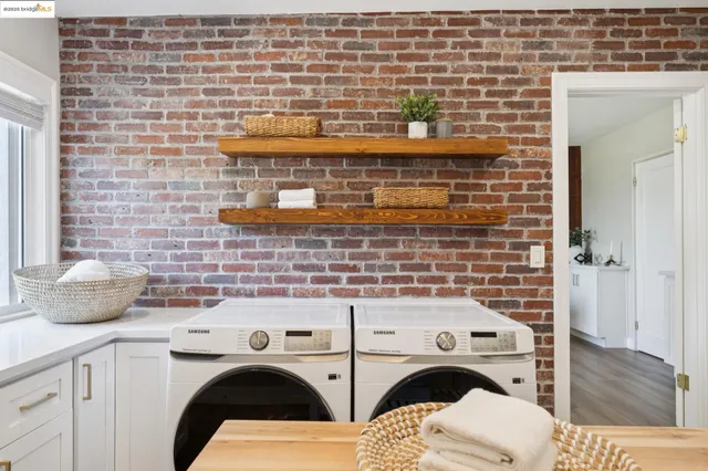 a bathroom with a toilet a sink and a mirror