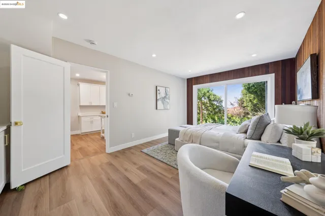 a view of a patio with couches and potted plants