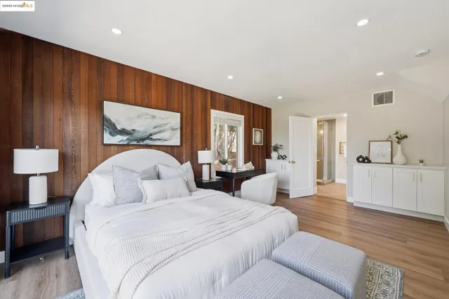 a view of a backyard with sitting area