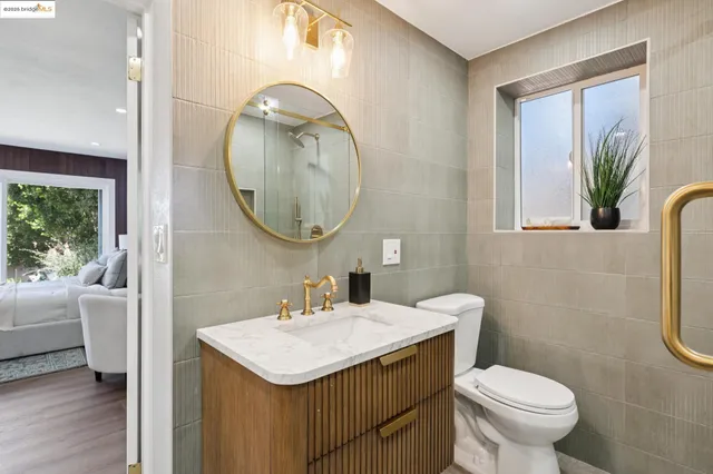 a view of a patio with chairs and tables