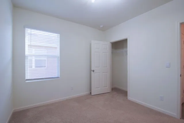 an empty room with windows