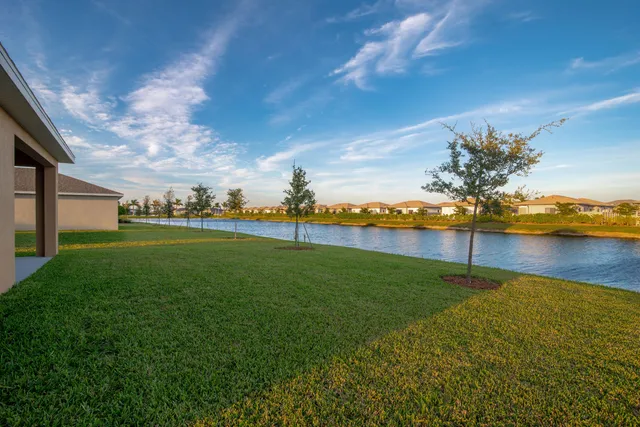 a view of a golf course with a lake
