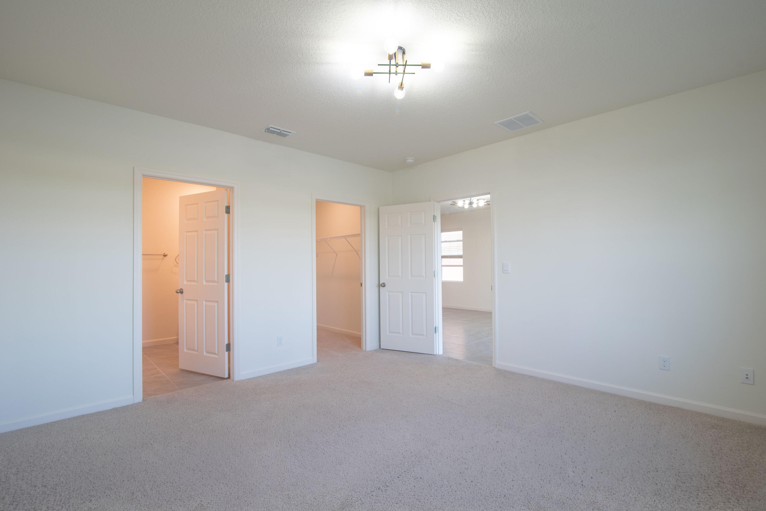 12152 Rimini Way Port St. Lucie, FL 34987 - Photo 7 of 24 a view of an empty room
