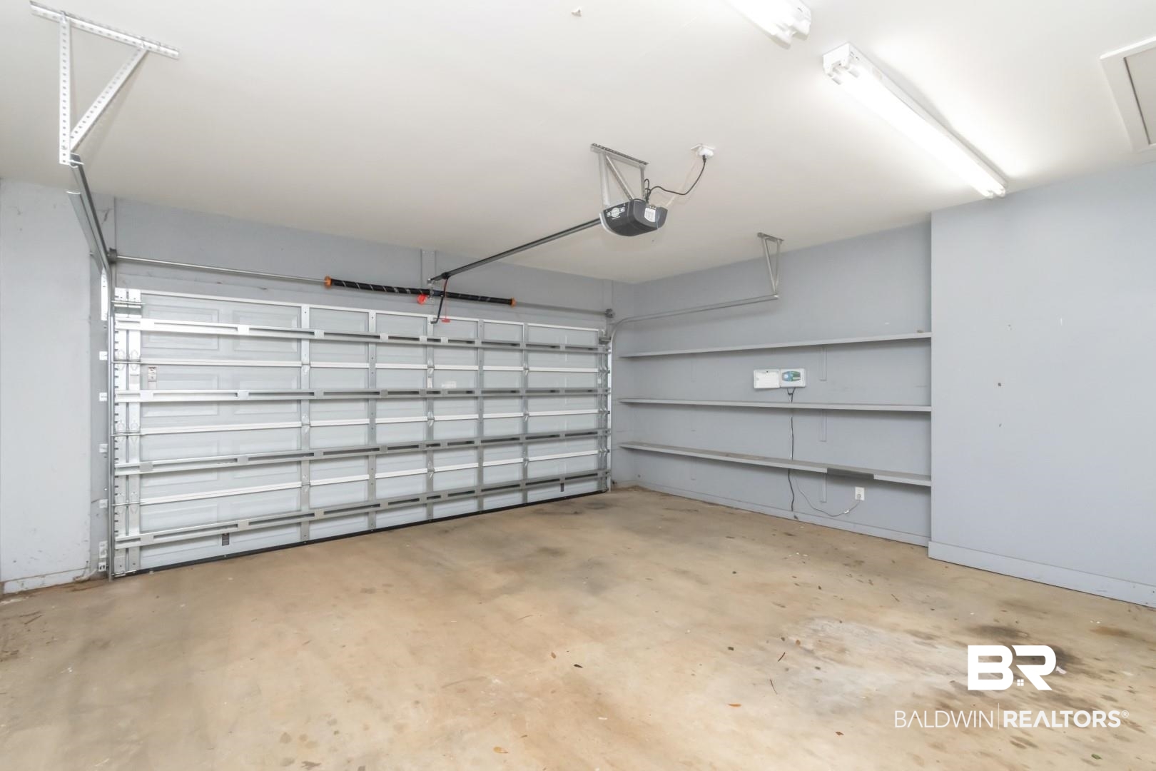 1205 Hillcrest Crossing East Mobile, AL 36695 - Photo 22 of 40 Garage with a garage door opener