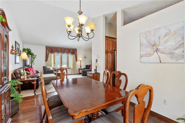 a living room with furniture rug and window