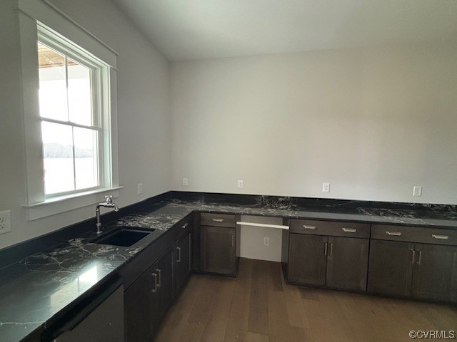 6090 Studley Road Hanover, VA 23069 - Photo 12 of 17 a kitchen with granite countertop a sink and cabinets