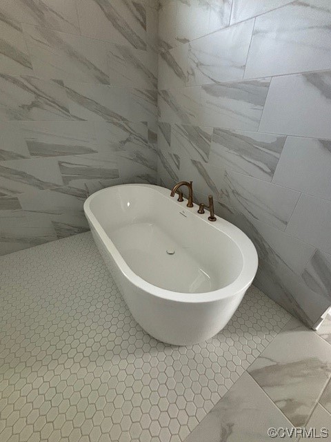 6090 Studley Road Hanover, VA 23069 - Photo 14 of 17 a white bath tub sitting in a bathroom