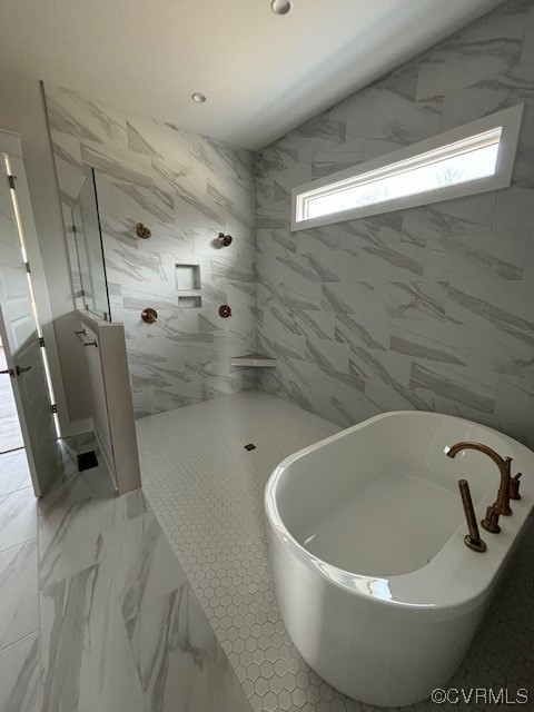 6090 Studley Road Hanover, VA 23069 - Photo 16 of 17 a bathroom with a tub and a shower