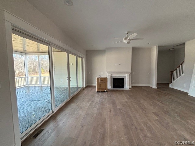 6090 Studley Road Hanover, VA 23069 - Photo 9 of 17 a view of empty room with wooden floor and fireplace