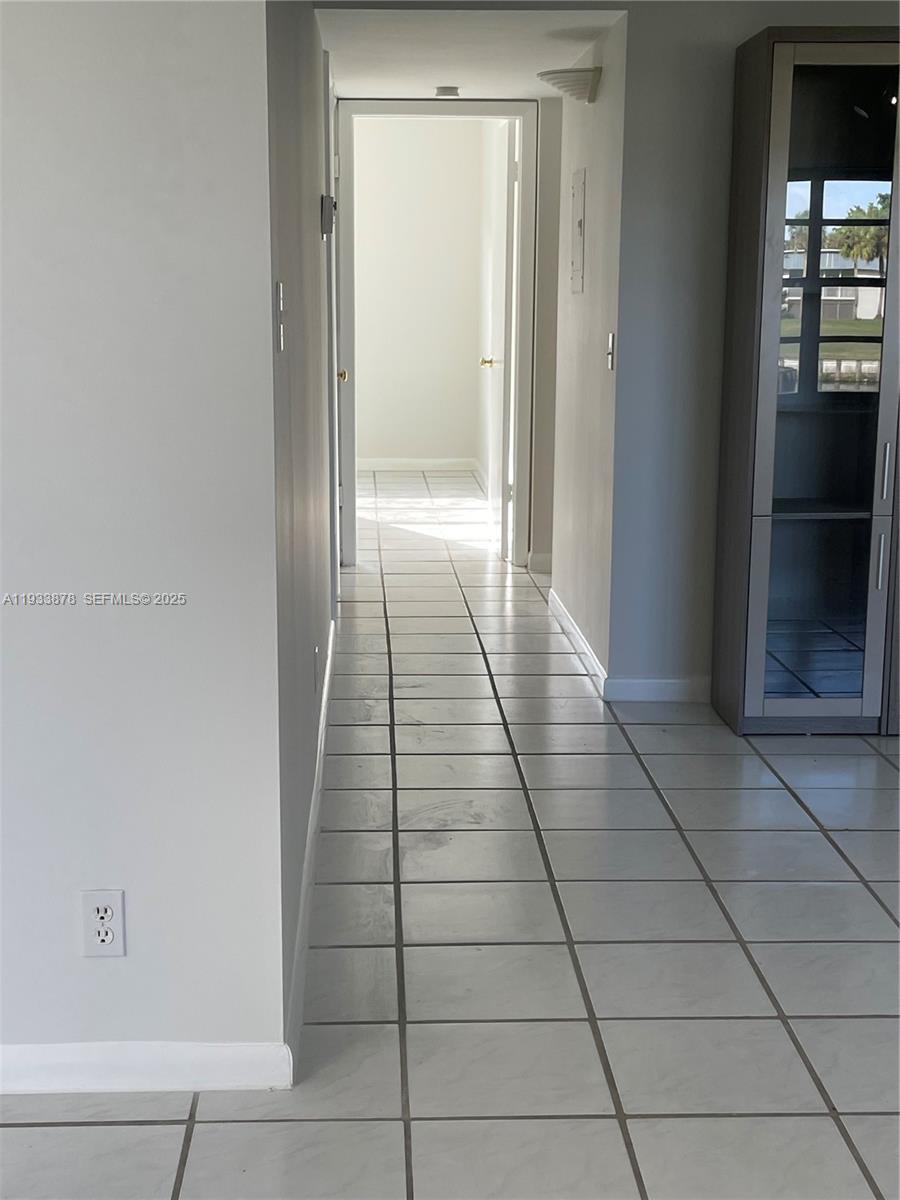 485 Flanders P, Unit 485 Delray Beach, FL 33484 - Photo 12 of 42 a bathroom with a shower and a toilet