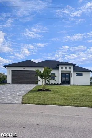 $360,000 | 128 Kismet Parkway West, Cape Coral, FL 33993