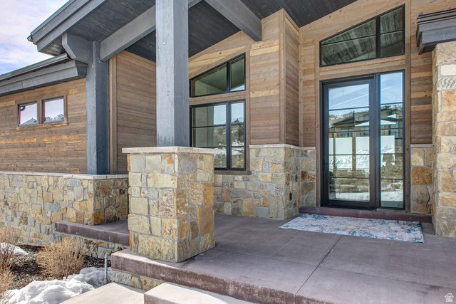 1282 Chimney Rock Road, Unit 344 Heber City, UT 84032 - Photo 3 of 55 Contemporary architectural design featuring wood-finish siding and a natural stone veneer base