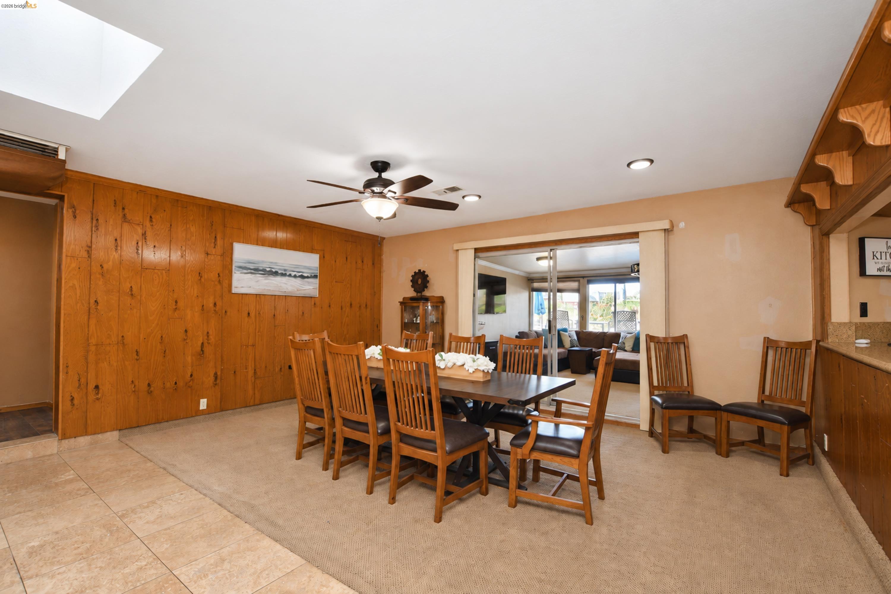 340 West Bolton Road Oakley, CA 94561 - Photo 22 of 87 Skylight, wood paneling, ceiling fan, recessed lighting, and sliding glass doors