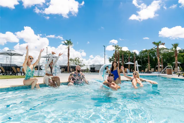 a view of a park with swings and slides
