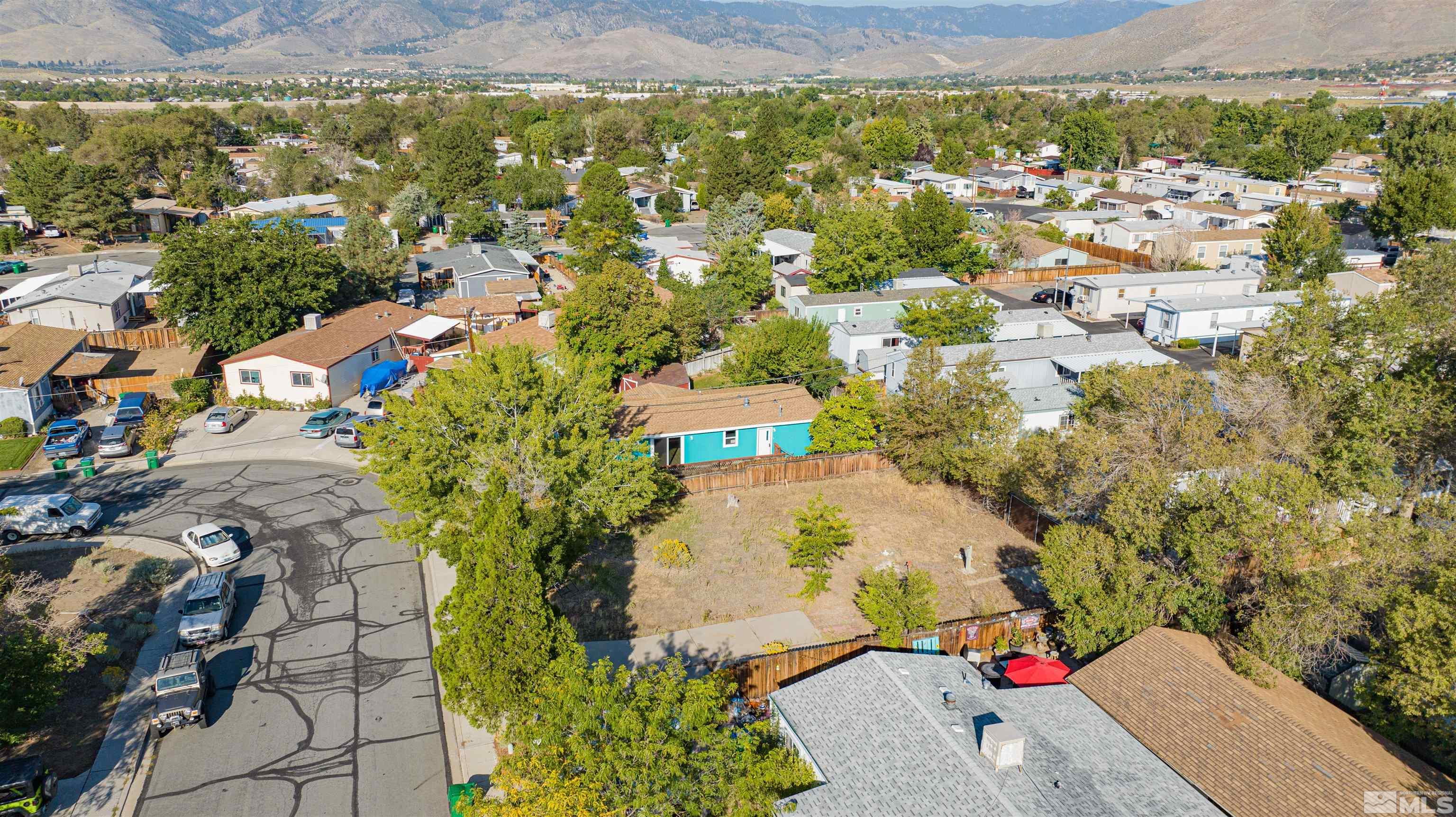 3088 Thurman Circle Carson City, NV 89706 - Photo 2 of 5 an aerial view of residential houses with outdoor space