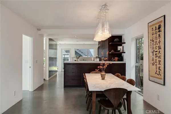 a kitchen with a sink cabinets and stainless steel appliances