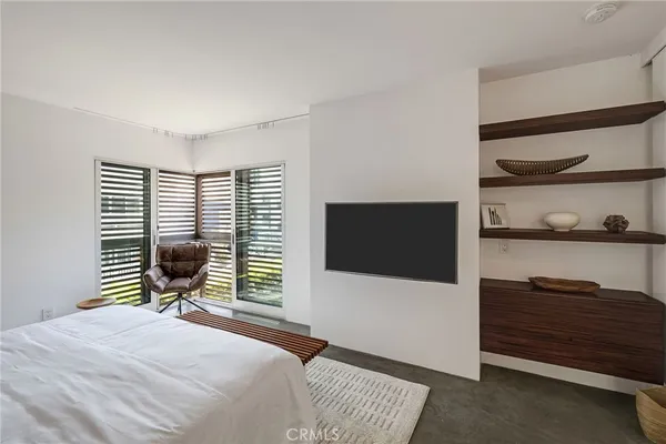 view of living room with furniture and floor to ceiling window