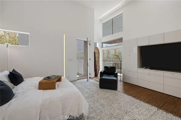 a bathroom with a shower and a sink