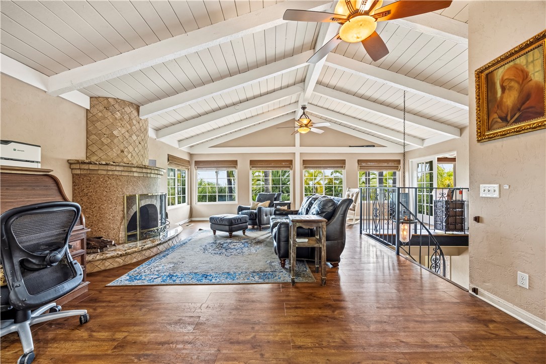 1485 Vía Ladera Fallbrook, CA 92028 - Photo 7 of 43 a view of a dining room with furniture wooden floor and chandelier