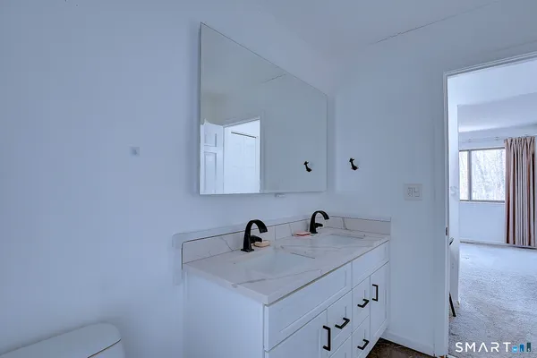a view of empty room with windows