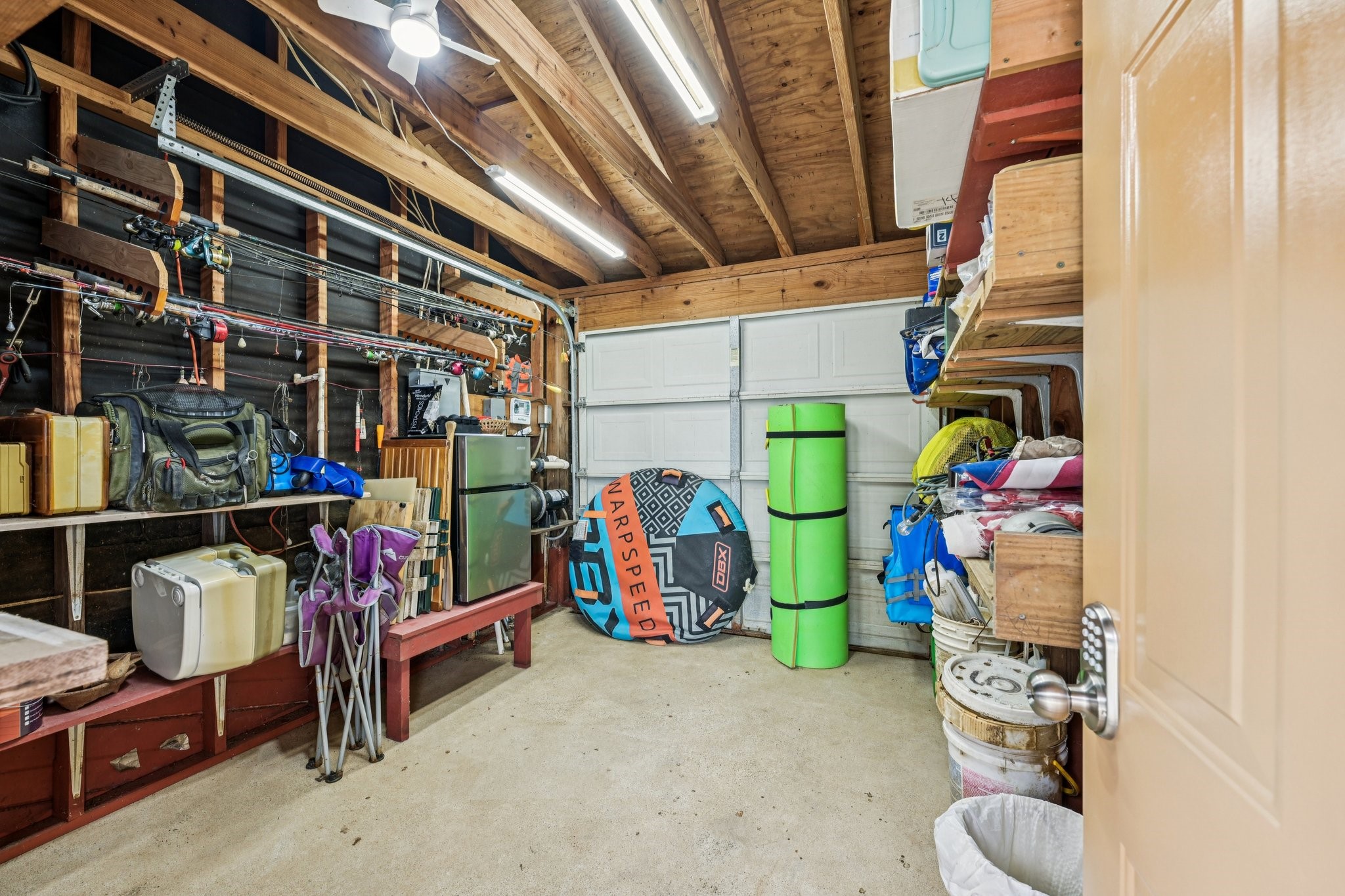 94 Lakeview Drive Huntsville, TX 77320 - Photo 35 of 45 Storage room in boathouse for all your lake hobbies