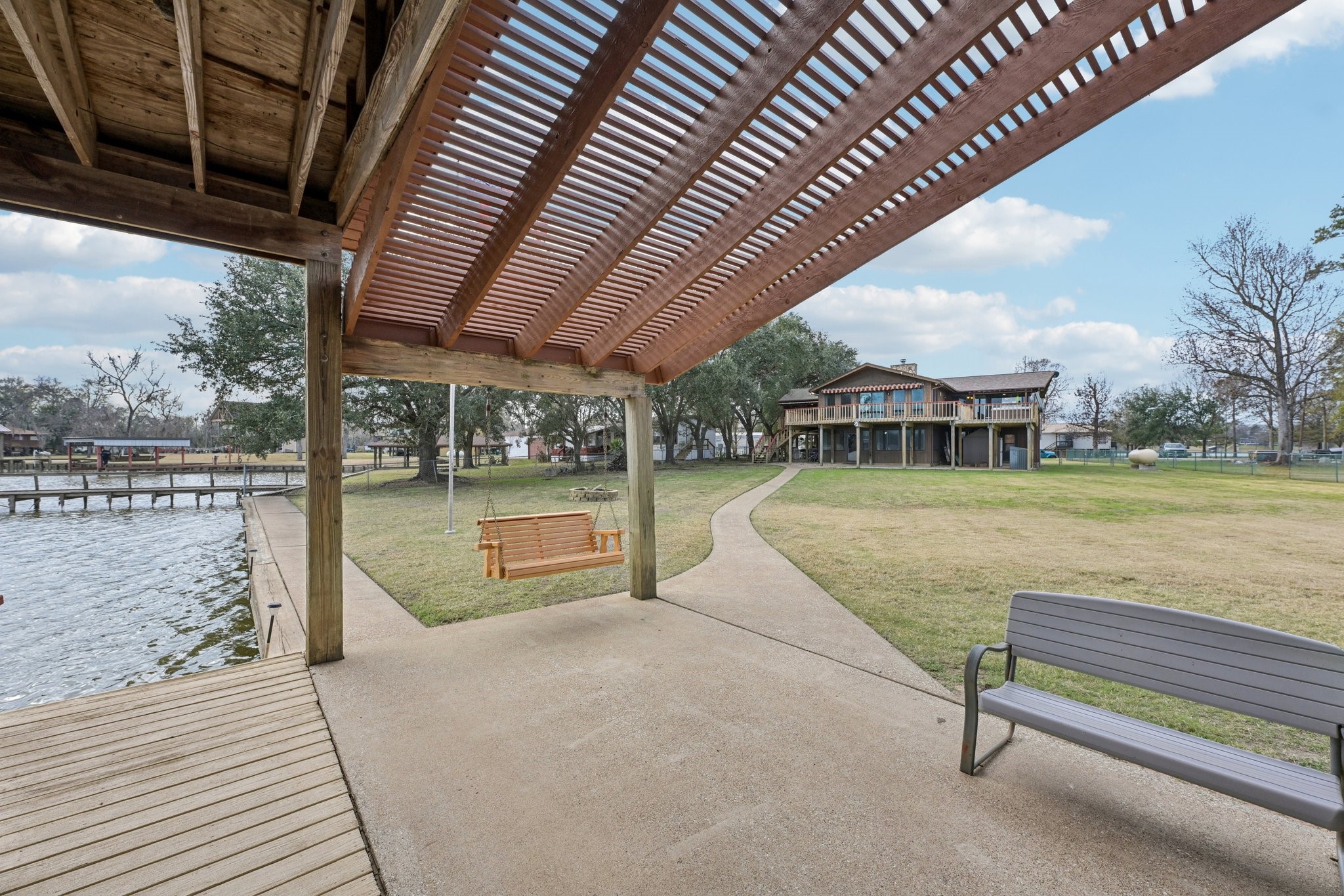94 Lakeview Drive Huntsville, TX 77320 - Photo 36 of 45 Porch Swing on Boat House